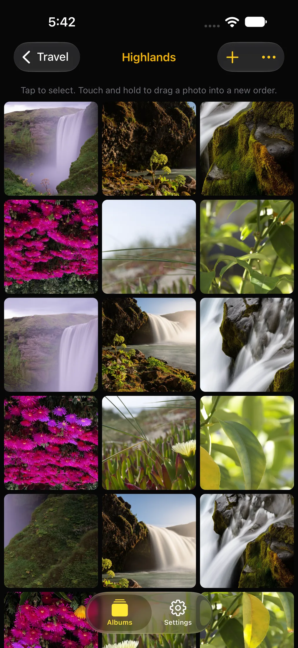 A single Frame album open, showing the photos inside it